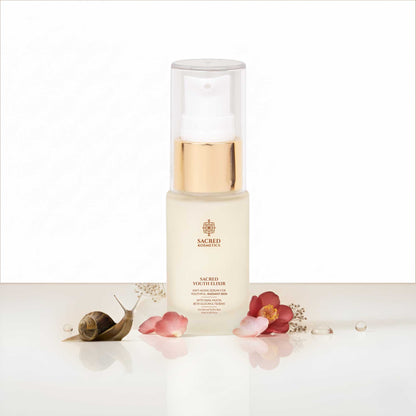 Skincare bottle with snail and flower on a white background